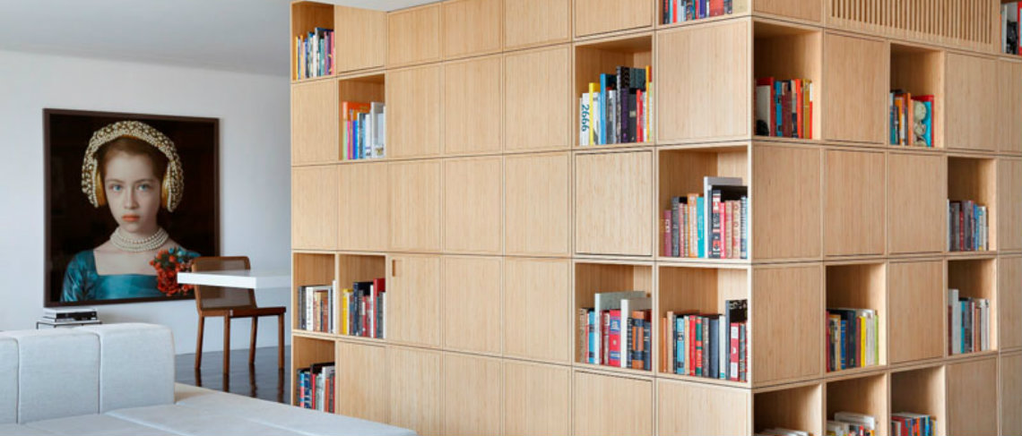 A Central Bookcase Hides The Entrance In This Modern Apartment